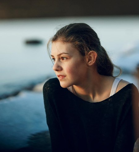 Teenage girl looking away